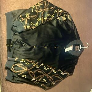 Flaucy. One of a kind satin jacket features “all seeing eye” brass buttons.